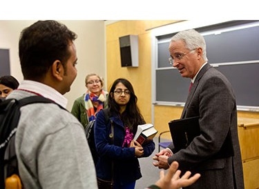 teacher talking to students